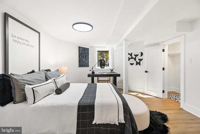 bedroom featuring hardwood / wood-style floors