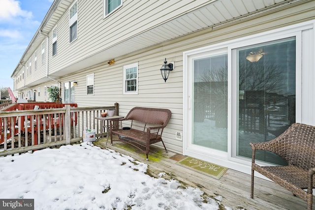 view of snow covered deck