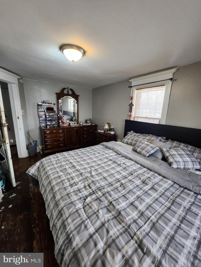 bedroom featuring hardwood / wood-style flooring