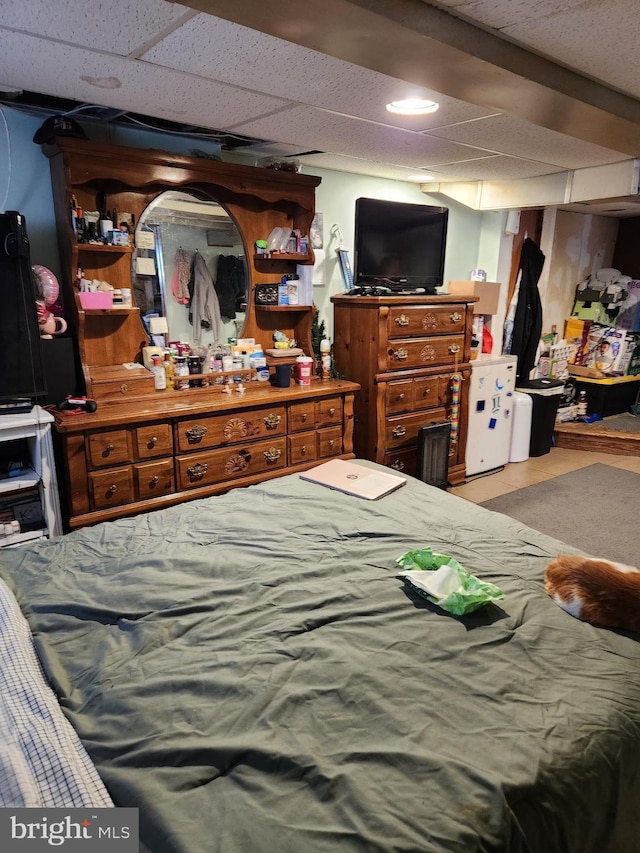 bedroom featuring a drop ceiling