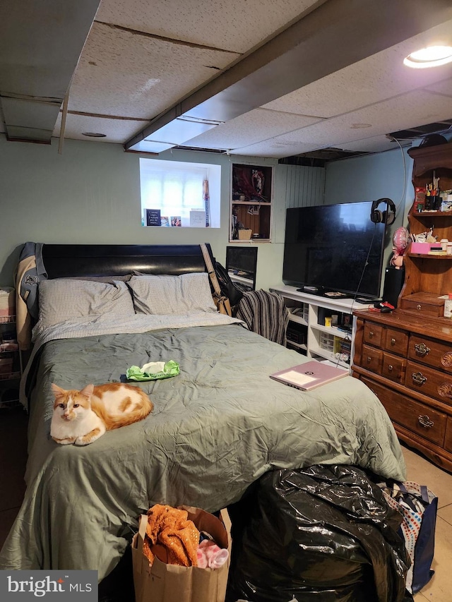 bedroom featuring a drop ceiling