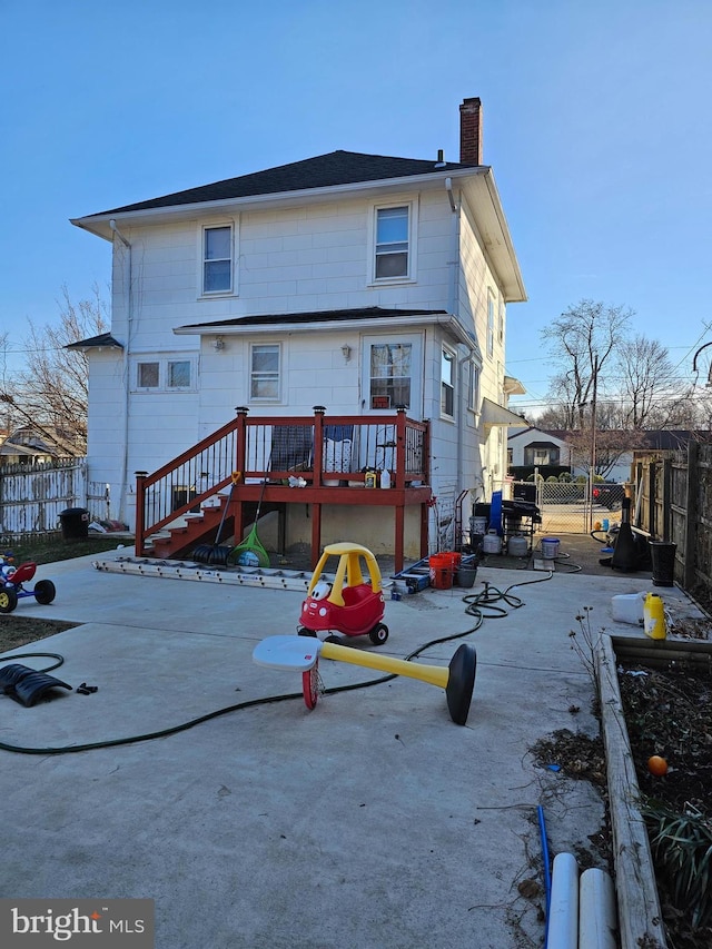 rear view of property with a patio