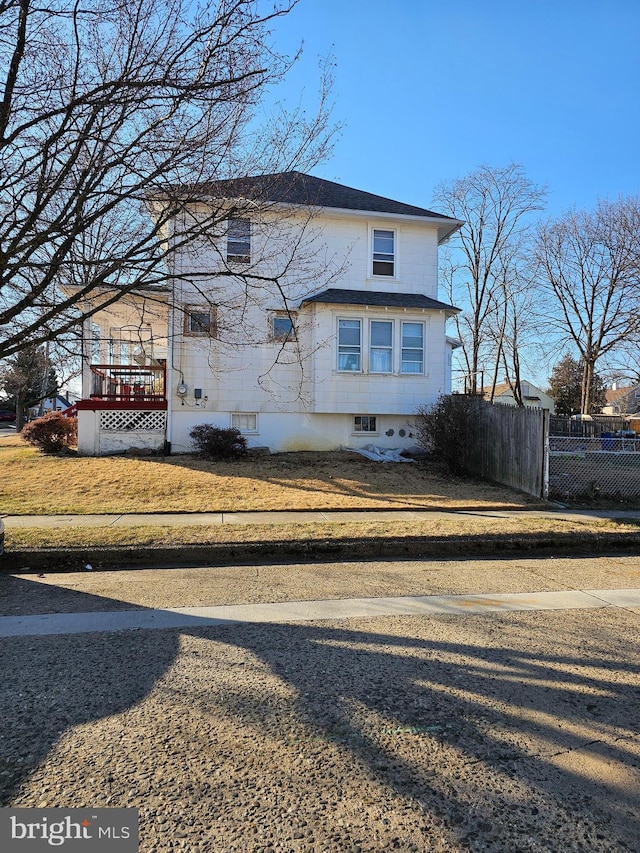 view of property exterior featuring a yard