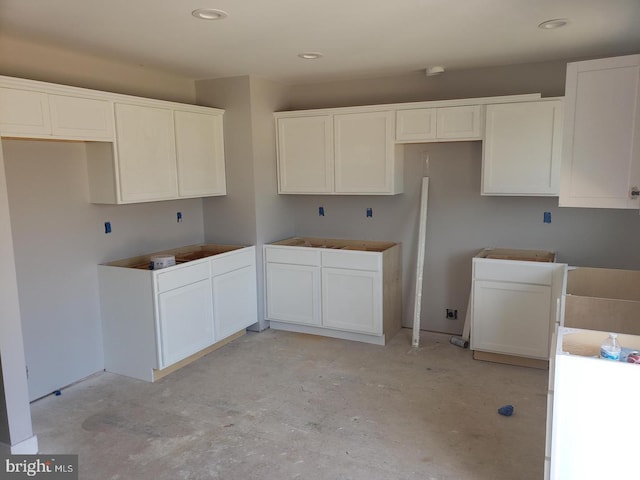 kitchen featuring white cabinetry