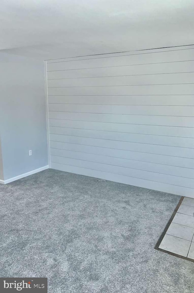 empty room featuring carpet flooring