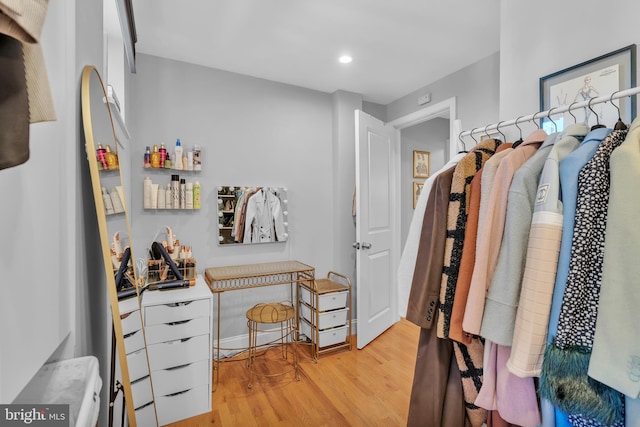 walk in closet featuring light wood-type flooring