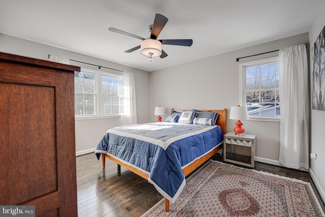 bedroom featuring ceiling fan and hardwood / wood-style flooring