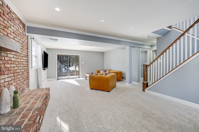 living room with carpet and ornamental molding