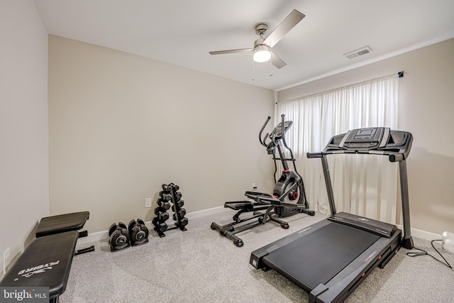 exercise room with ceiling fan