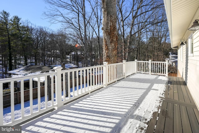 view of snow covered deck