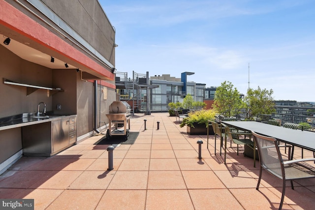 view of patio / terrace featuring sink and grilling area