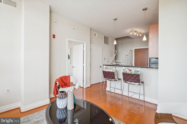 dining area with light hardwood / wood-style floors