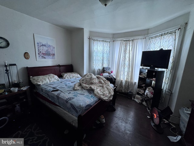 bedroom featuring multiple windows