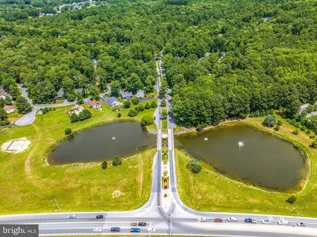 drone / aerial view featuring a water view