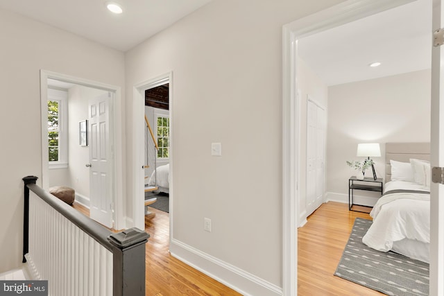 hall featuring wood-type flooring