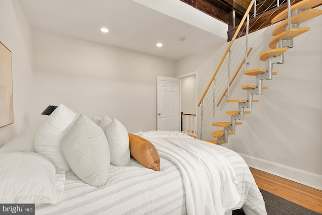 bedroom featuring hardwood / wood-style flooring