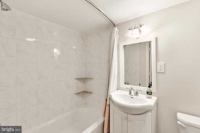 full bathroom featuring vanity, toilet, and shower / bathtub combination with curtain