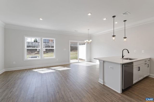 kitchen with stainless steel dishwasher, crown molding, sink, decorative light fixtures, and white cabinetry