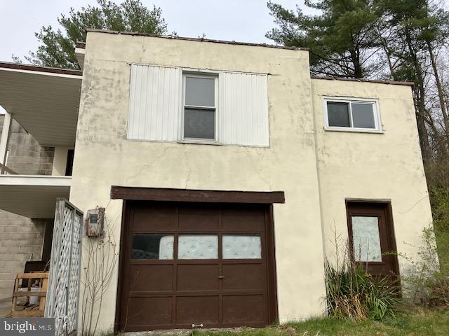 exterior space with a garage