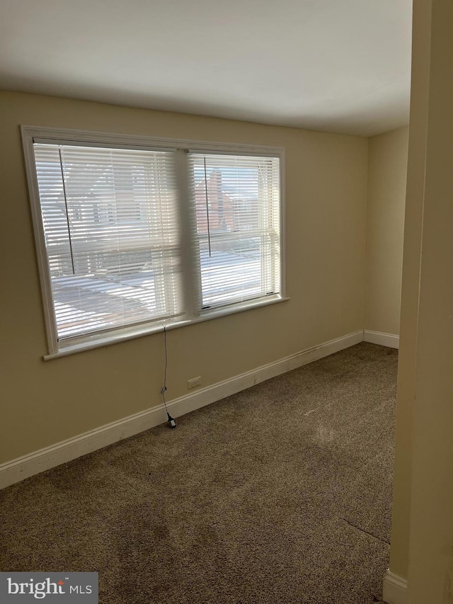 view of carpeted spare room