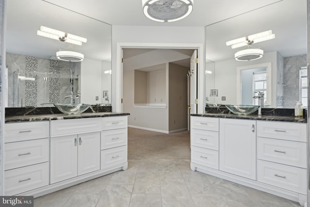 bathroom with vanity and walk in shower