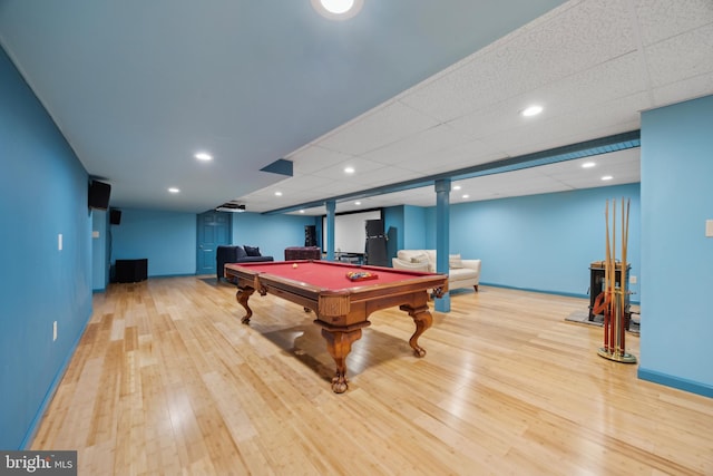 rec room with light wood-type flooring, a drop ceiling, and pool table