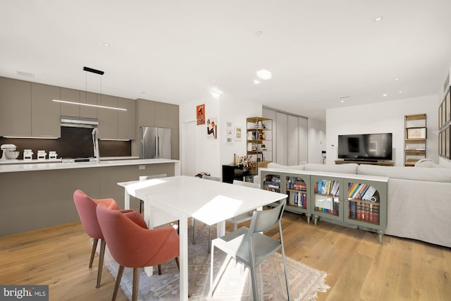 dining area featuring light hardwood / wood-style flooring