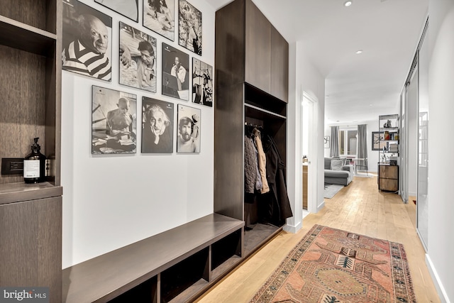 mudroom with light wood-type flooring