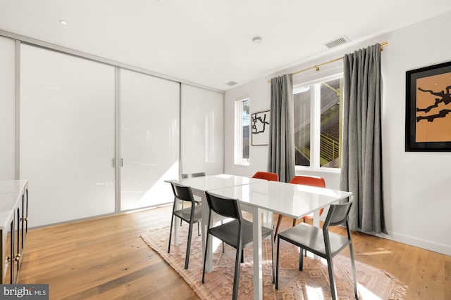 dining area featuring light hardwood / wood-style flooring