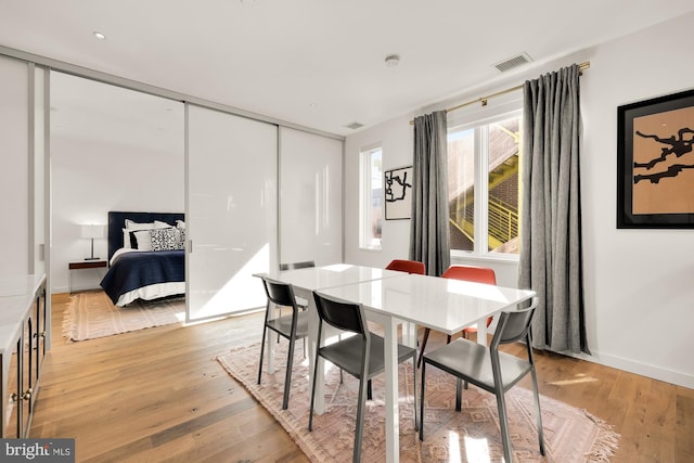 dining space featuring light hardwood / wood-style flooring