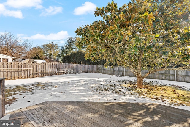 view of snow covered deck