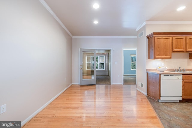 kitchen with dishwasher, light hardwood / wood-style floors, sink, and crown molding