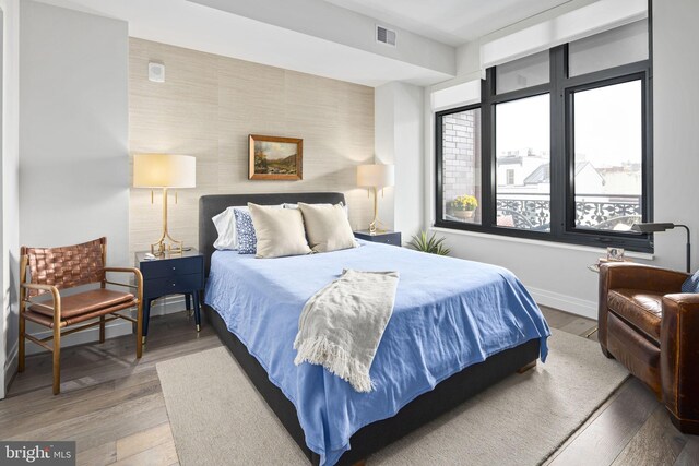 bedroom featuring wood-type flooring