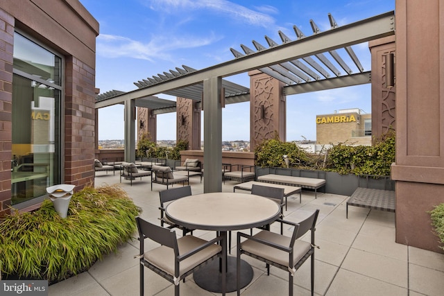 view of patio with a pergola and outdoor lounge area