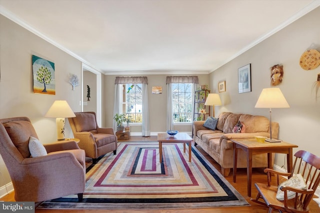 living room with hardwood / wood-style flooring and ornamental molding