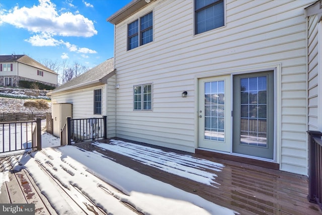 view of snow covered deck