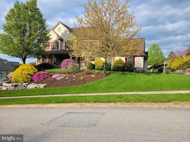 view of front of house featuring a front yard