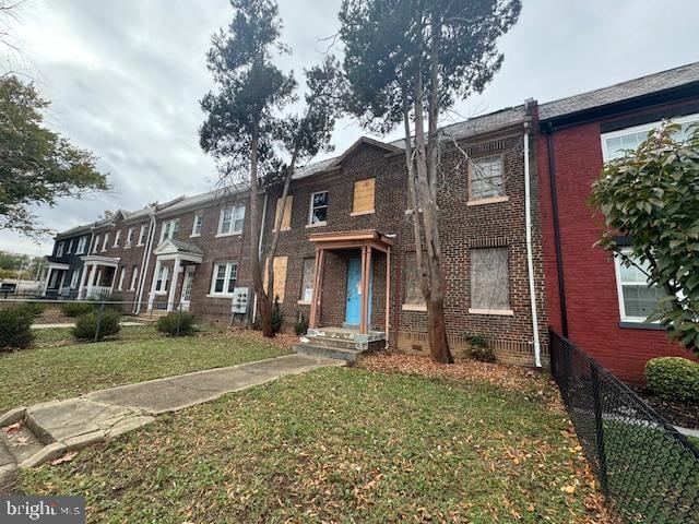 view of property with a front yard