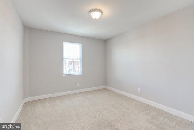 unfurnished room featuring carpet floors