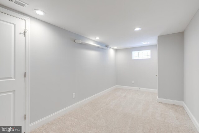 basement with light carpet