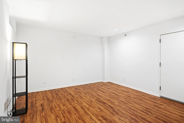 empty room featuring hardwood / wood-style floors