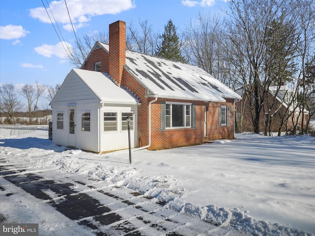 view of snow covered property