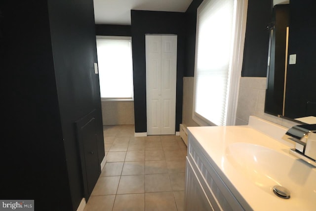 bathroom with tile patterned floors and sink