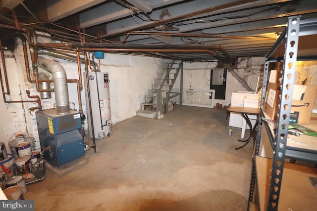 basement with washer / dryer, electric panel, and gas water heater