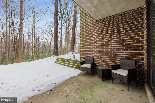 view of snow covered patio