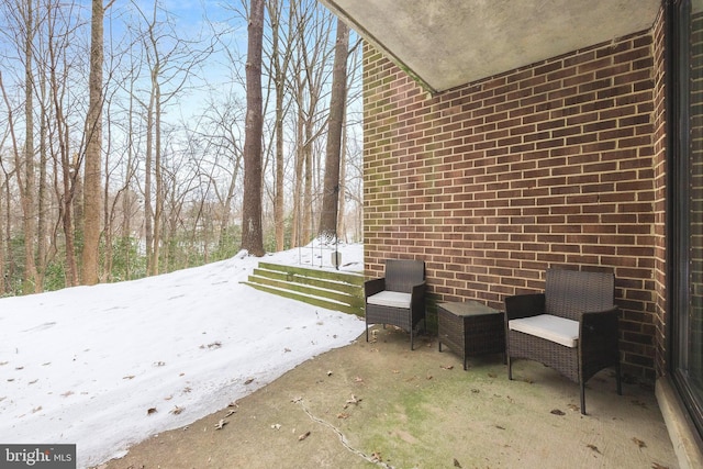 view of snow covered patio