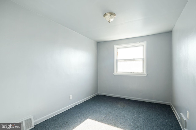 empty room featuring carpet