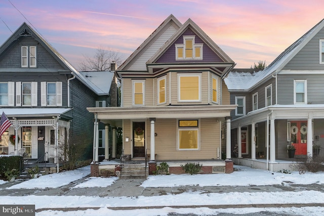 victorian home featuring covered porch