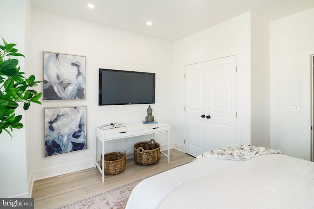 bedroom with light wood-type flooring