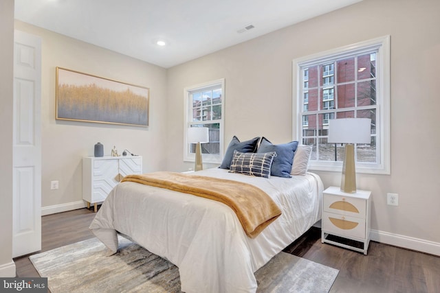 bedroom featuring dark wood-type flooring